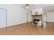 Inviting living room with a stone fireplace, wood-look floors, and abundant natural light for a comfortable living space at 85 Emily Trce, Covington, GA 30016