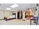 Spacious basement bedroom with a decorative brick archway leading to additional living space at 104 Kremer Falls Trce, Canton, GA 30114