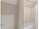 Clean bathroom with white tile and shower/tub combo, and lots of natural light at 104 Kremer Falls Trce, Canton, GA 30114