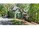 Beautiful two-story home featuring a well-maintained lawn and inviting stone accents at 104 Kremer Falls Trce, Canton, GA 30114