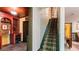 Hallway with bar featuring wine storage and steps leading to an upper level at 104 Kremer Falls Trce, Canton, GA 30114