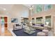 Bright and airy living room with hardwood floors, neutral furniture, and plenty of natural light at 104 Kremer Falls Trce, Canton, GA 30114