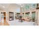Bright and airy living room with a fireplace, hardwood floors, and plenty of natural light at 104 Kremer Falls Trce, Canton, GA 30114