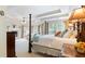 Luxurious main bedroom with tray ceilings, a fireplace, and an attached seating area at 104 Kremer Falls Trce, Canton, GA 30114