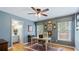 Charming home office with hardwood floors, built-in storage, and ample natural light at 104 Kremer Falls Trce, Canton, GA 30114