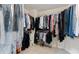 Large walk-in closet with ample space for clothing and accessories at 104 Kremer Falls Trce, Canton, GA 30114
