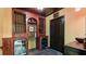Custom wine cellar with built-in storage, wine fridge, and decorative lighting at 104 Kremer Falls Trce, Canton, GA 30114