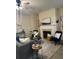 Cozy living room with fireplace and modern furniture at 2991 Greyhawk Ln, Cumming, GA 30040