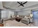 Finished basement featuring a large sectional and comfortable seating area at 9770 Rod Rd, Alpharetta, GA 30022
