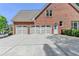 Three car garage and driveway at 9770 Rod Rd, Alpharetta, GA 30022