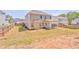 An expansive backyard offering ample space and featuring a covered patio for outdoor enjoyment at 1302 Gardenia Ct, Villa Rica, GA 30180