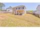A serene backyard with a well-maintained lawn, perfect for outdoor activities and relaxation at 1302 Gardenia Ct, Villa Rica, GA 30180