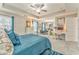 Bedroom with tray ceiling, nice carpet and a lovely blue decor at 1302 Gardenia Ct, Villa Rica, GA 30180