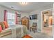 Well-appointed bedroom featuring a cozy bed, stylish decor, and a large window for ample natural light at 1302 Gardenia Ct, Villa Rica, GA 30180