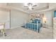 Bedroom with tray ceiling, nice carpet and a lovely blue decor at 1302 Gardenia Ct, Villa Rica, GA 30180
