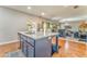 Kitchen island offers a sink and views of the living room at 1302 Gardenia Ct, Villa Rica, GA 30180