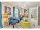 Sitting room with chandelier, decorative art and easy access to the bathroom at 1302 Gardenia Ct, Villa Rica, GA 30180
