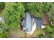 An aerial perspective showcases the property's roof, lush greenery, and expansive yard at 2356 Pinkney Dr, Marietta, GA 30062