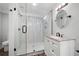 Updated bathroom with glass shower, modern vanity and marble countertop at 2356 Pinkney Dr, Marietta, GA 30062