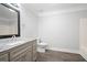 Bathroom with granite vanity, new flooring, and fixtures at 2356 Pinkney Dr, Marietta, GA 30062