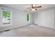 Spacious bedroom with neutral paint, carpet flooring, and closet space at 2356 Pinkney Dr, Marietta, GA 30062