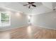 Light-filled bedroom with hardwood floors, tray ceiling, and ample windows at 2356 Pinkney Dr, Marietta, GA 30062