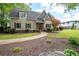 Attractive home features a welcoming walkway leading to a charming covered entryway and well-kept lawn at 2356 Pinkney Dr, Marietta, GA 30062