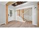 Bright foyer features wood floors, an exposed beam, and a staircase leading to the second floor at 2356 Pinkney Dr, Marietta, GA 30062