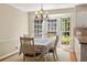 Sunlit breakfast nook features a bay window and access to the outdoors at 1000 N Harbor Ct, Atlanta, GA 30328