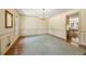 Traditional dining room with hardwood floors, chandelier, and paneled walls at 1000 N Harbor Ct, Atlanta, GA 30328