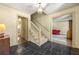 Elegant foyer with slate tile floor and views into adjoining rooms and staircase at 1000 N Harbor Ct, Atlanta, GA 30328