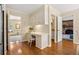 A convenient home office area with white cabinets and desk next to kitchen at 1000 N Harbor Ct, Atlanta, GA 30328