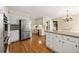 Bright kitchen with stainless steel appliances, island bar, and built-in desk space at 1000 N Harbor Ct, Atlanta, GA 30328