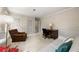 Comfortable living room with desk, sofa, chair and natural light at 1000 N Harbor Ct, Atlanta, GA 30328