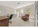 Comfortable living room with desk, sofa, chair and natural light at 1000 N Harbor Ct, Atlanta, GA 30328