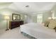 Bright main bedroom with carpet, natural light, and an attached bathroom at 1000 N Harbor Ct, Atlanta, GA 30328