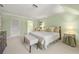 Spacious main bedroom featuring carpeted floors, natural light, and tasteful decor at 1000 N Harbor Ct, Atlanta, GA 30328