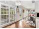 Cozy breakfast nook with natural light, hardwood floors, and view to the deck at 105 Blackberry Ct, Woodstock, GA 30188