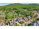Scenic aerial view of a charming neighborhood with lush trees, manicured lawns, and upscale homes at 1401 Kings Park Nw Dr, Kennesaw, GA 30152