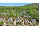 Lovely aerial view of homes and neighborhood with mature trees and well-kept lawns at 1401 Kings Park Nw Dr, Kennesaw, GA 30152