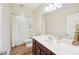 Full bathroom with modern vanity, white countertops, and shower-tub combination with tile surround at 1401 Kings Park Nw Dr, Kennesaw, GA 30152