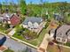Two-story home with beautiful landscaping, surrounded by mature trees at 1401 Kings Park Nw Dr, Kennesaw, GA 30152