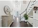 Grand foyer with high ceilings, elegant staircase, and beautiful hardwood floors at 1401 Kings Park Nw Dr, Kennesaw, GA 30152