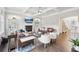 Bright living room with coffered ceiling, fireplace, built-ins, and hardwood floors at 1401 Kings Park Nw Dr, Kennesaw, GA 30152