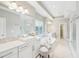 Bright bathroom with double vanity, soaking tub, and walk-in shower at 1401 Kings Park Nw Dr, Kennesaw, GA 30152