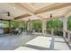 Spacious covered patio with ceiling fans and outdoor kitchen area is great for entertaining at 1401 Kings Park Nw Dr, Kennesaw, GA 30152