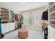 Walk-in closet with custom shelving and storage at 1401 Kings Park Nw Dr, Kennesaw, GA 30152