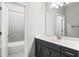 Well-lit bathroom with updated vanity, stylish fixtures, and a separate tub/shower at 4356 Jenkins Ne Dr, Roswell, GA 30075