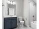 Bathroom featuring vanity, mirror, and shower with tub combination at 4356 Jenkins Ne Dr, Roswell, GA 30075