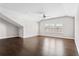 Bonus room featuring hardwood floors, ceiling fan, and windows with wooded view at 4356 Jenkins Ne Dr, Roswell, GA 30075